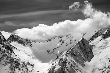 Image showing Black and white winter mountains in clouds