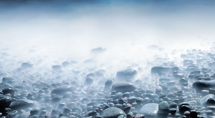 Image showing Water and rolling stones