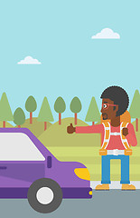 Image showing Young man hitchhiking vector illustration.