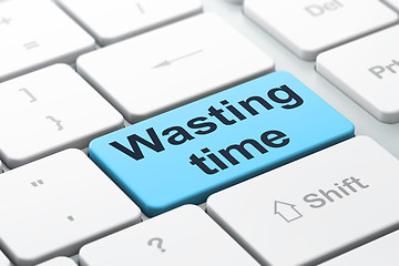 Image showing Time concept: Wasting Time on computer keyboard background