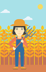 Image showing Female farmer with pitchfork vector illustration.