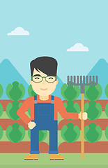 Image showing Farmer with rake vector illustration.