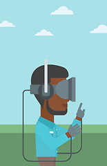 Image showing Man in virtual reality headset playing video game.