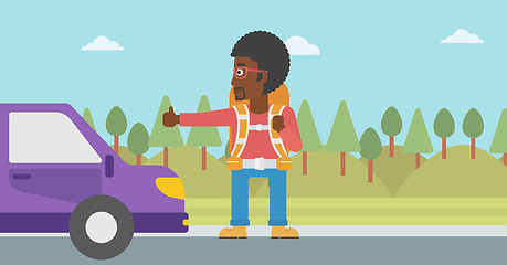 Image showing Young man hitchhiking vector illustration.