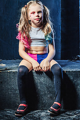 Image showing The funny crasy girl on dark background