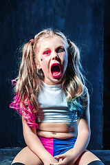 Image showing The funny crasy girl on dark background