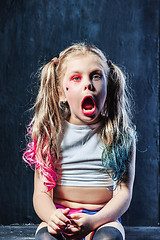 Image showing The funny crasy girl on dark background