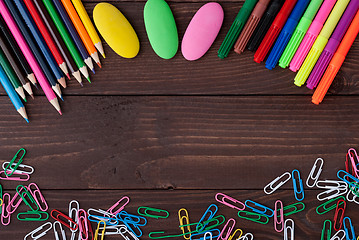 Image showing School supplies on a wooden table