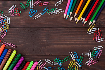 Image showing School supplies on a wooden table