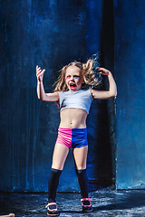Image showing The funny crasy girl on dark background