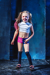 Image showing The funny crasy girl on dark background