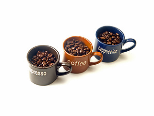 Image showing coffee cups with coffee beans