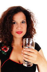 Image showing Beautiful woman holding glass water.