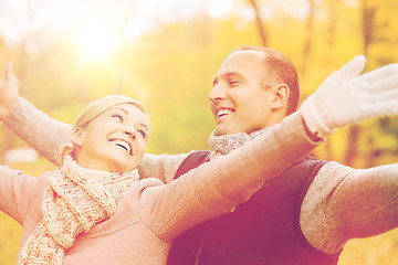 Image showing smiling couple in autumn park