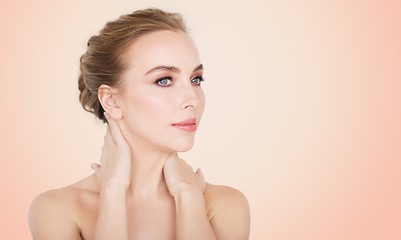 Image showing beautiful young woman face and hands