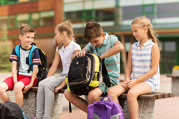 Image showing group of elementary school students with backpacks