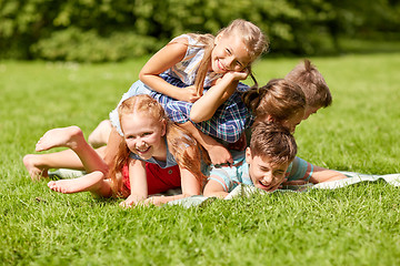Image showing happy kids playing and having fun in summer park
