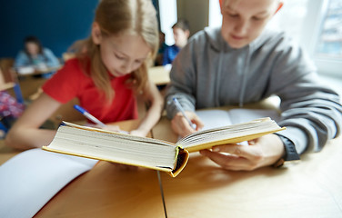 Image showing high school students reading book and learning