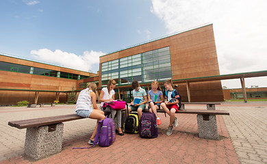 Image showing group of happy elementary school students outdoors