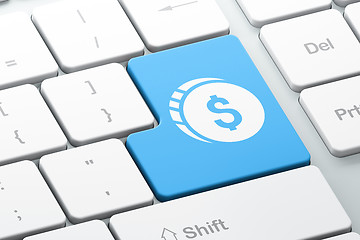 Image showing Banking concept: Dollar Coin on computer keyboard background