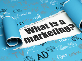 Image showing Marketing concept: black text What is a Marketing? under the piece of  torn paper