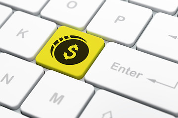 Image showing Currency concept: Dollar Coin on computer keyboard background