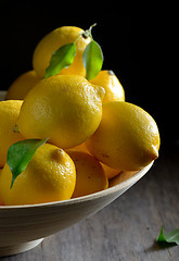 Image showing lemons on an old wooden table