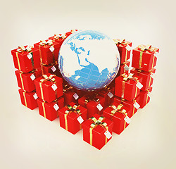 Image showing Traditional Christmas gifts and earth. Global holiday concept. 3