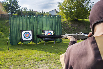 Image showing Medieval archer to use a crossbow and shoot at a target