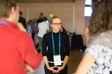 Image showing People interacting during coffee break at medical conference.