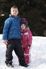 Image showing Brother and sister portrait in winter time