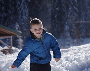 Image showing kids playing with  fresh snow