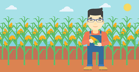 Image showing Farmer holding corn vector illustration.