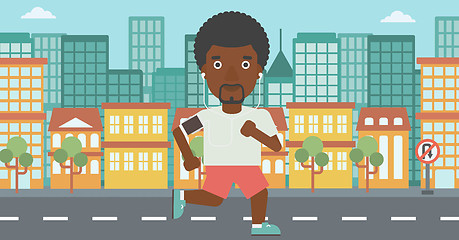 Image showing Man running with earphones and smartphone.