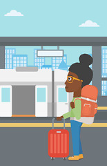 Image showing Woman at the train station vector illustration.