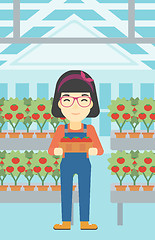 Image showing Farmer collecting tomatos vector illustration.