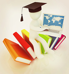 Image showing 3d man in graduation hat sitting on books and working at his lap