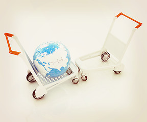 Image showing Trolley for luggage at the airport and earth. International tour