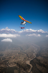 Image showing Ultralight trike and plane fly over Pokhara and Annapurna region