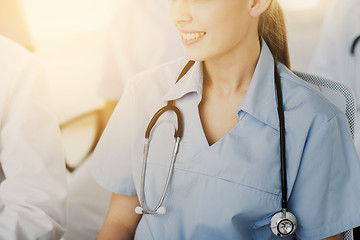 Image showing close up of doctor with stethoscope at seminar