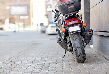 Image showing close up of motorcycle parked on city street