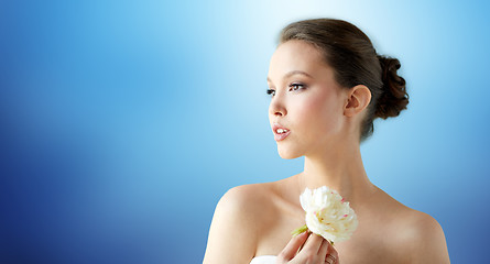 Image showing beautiful asian woman with flower and jewelry