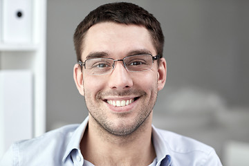 Image showing portrait of businessman in eyeglasses at office