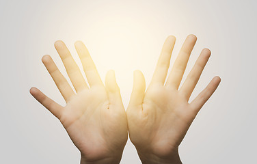Image showing close up of two hands showing palms