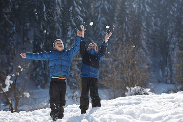 Image showing kids playing with  fresh snow