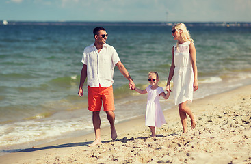 Image showing happy family in sunglasses on summer beach