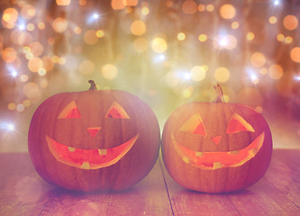 Image showing close up of carved halloween pumpkins on table