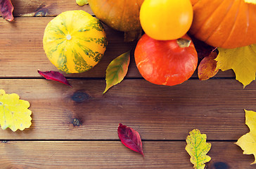 Image showing close up of pumpkins on wooden table at home