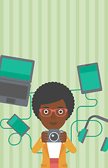 Image showing Woman surrounded with her gadgets.