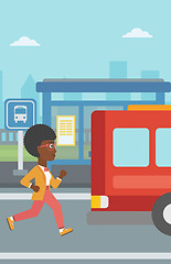 Image showing Latecomer woman running for the bus.